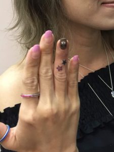 Simple tattoo on finger